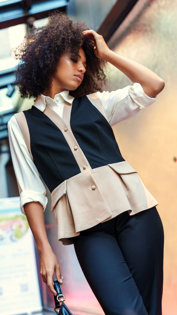 Black vest with peplum
